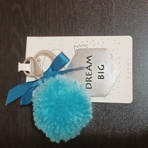 Stylish Blue Pom Pom 'Dream Big' Worn Silver Keychain